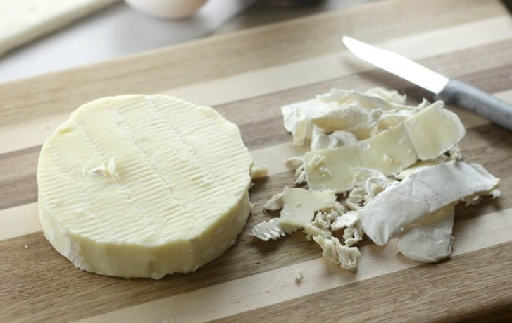 Trimmed-rind-of-Brie-cheese