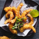 Coconut-crumbed prawns with lime aioli